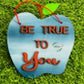 Apple shaped motivational hanging decor quote